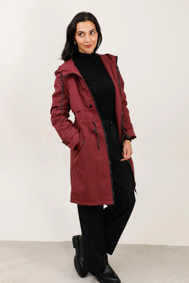 Parka longue imperméable bordeaux à capuche