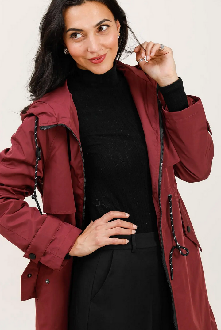 Parka longue imperméable bordeaux à capuche