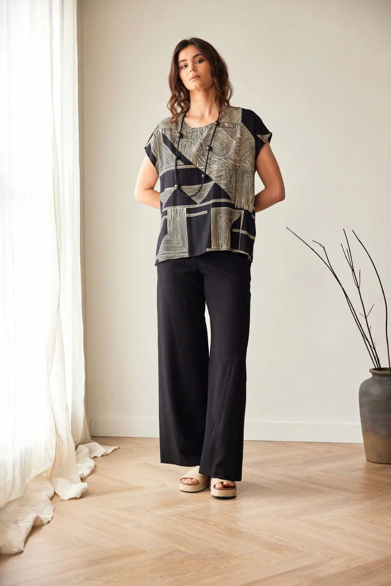 Haut Peruzzi à imprimé géométrique noir et or