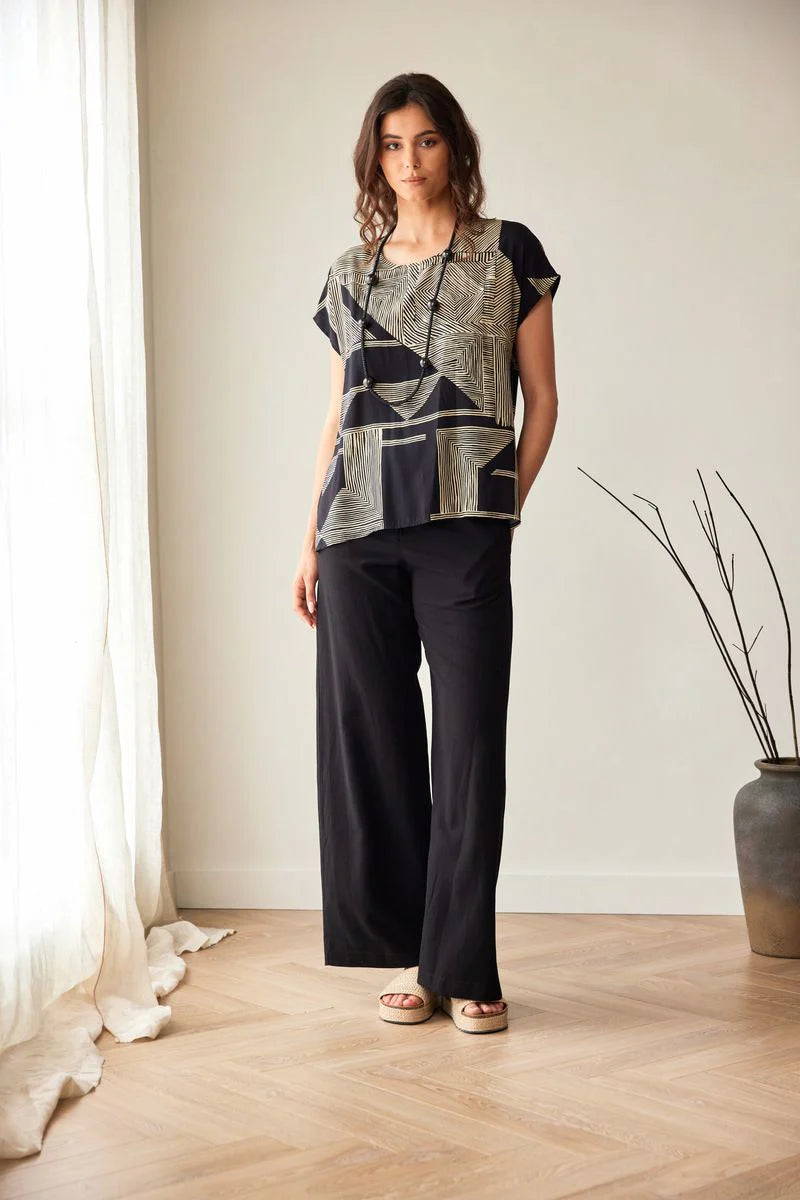 Haut Peruzzi à imprimé géométrique noir et or