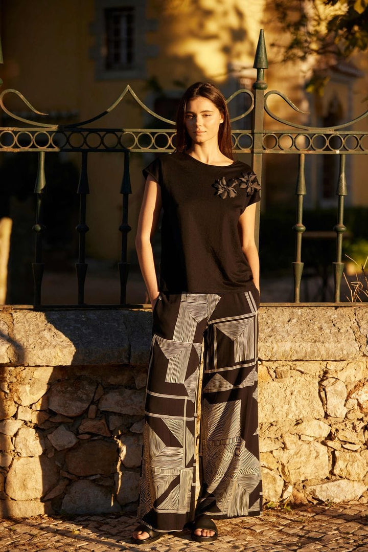 Pantalon large géométrique noir et or Peruzzi