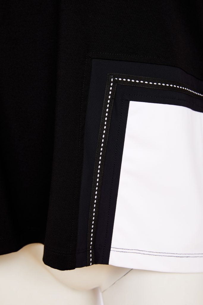 Haut NAYA à poches contrastées noires et blanches